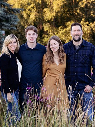 Dr. Hartman with his wife, Kristy, and their two kids, Thomas and Taylor